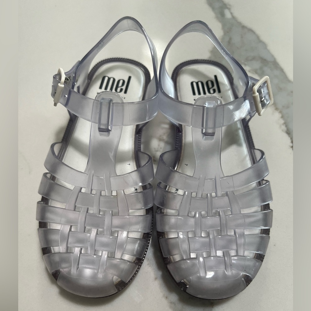 Mini Melissa clear, toddler size 11. Used vey good condition.